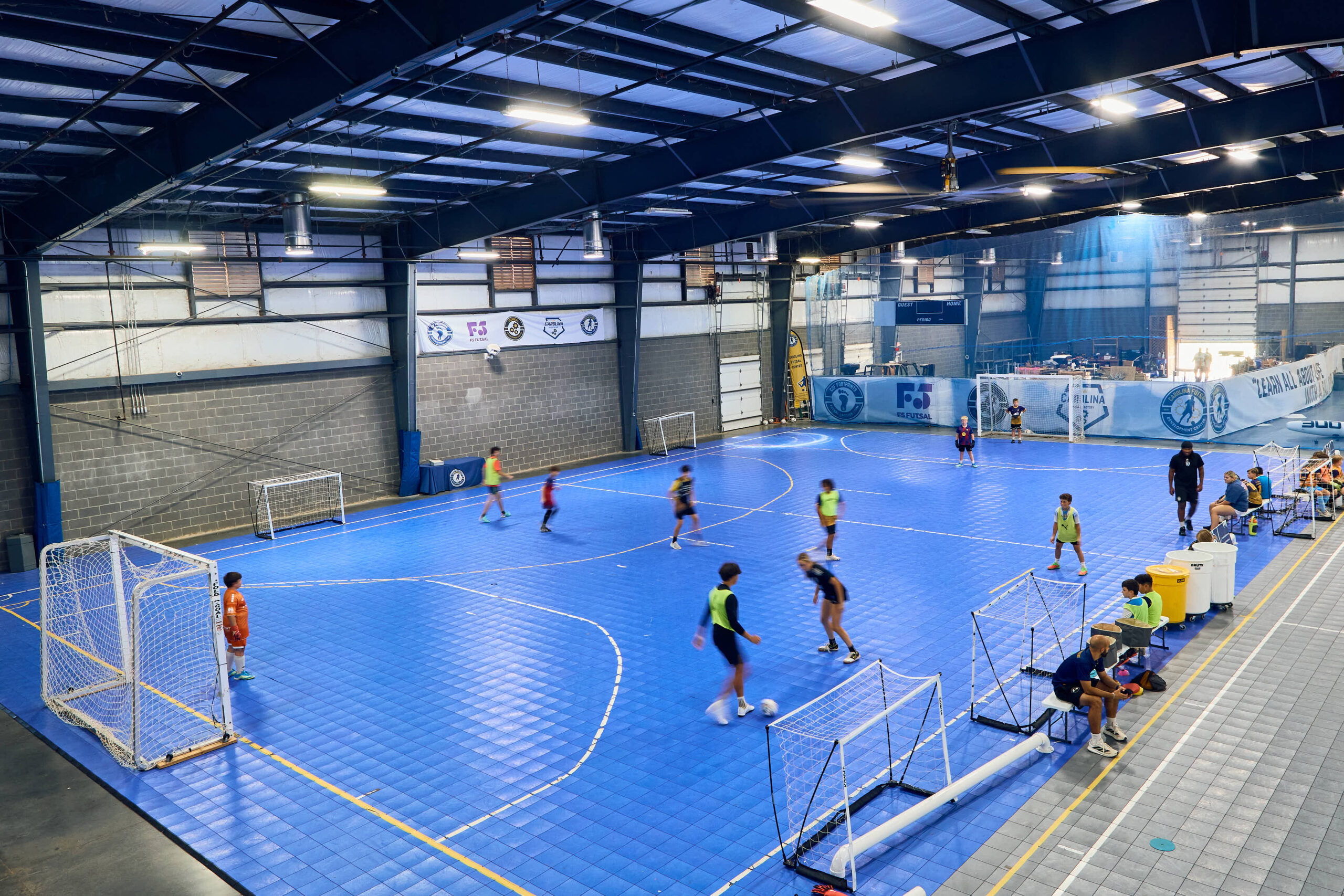 Young players training on the indoor futsal courts at Carolina Futsal Center in Rock Hill